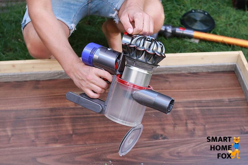 Mеханизм опорожнения Dyson V8